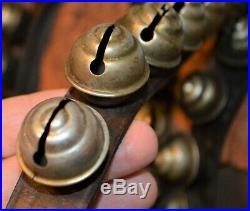 Nice Antique Acorn Style Brass or other Sleigh Bells Strand 58 Bells & 8' Strand