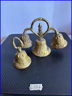 Rare heavy brass religious bell with 4 bells