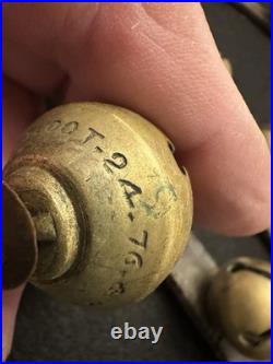 String of 34 1 Antique 1878 Brass Sleigh Bells Great Bells, Strap Not So Much