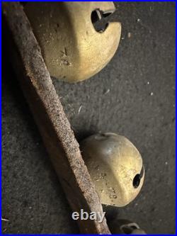 String of 34 1 Antique 1878 Brass Sleigh Bells Great Bells, Strap Not So Much