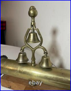 Unique vintage polished brass sleigh mount 3 bells tower wood stand