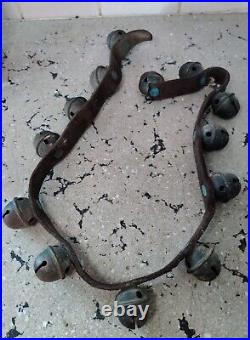 Vintage 13 Brass Jingle Sleigh Bells on a Torn Leather Strap