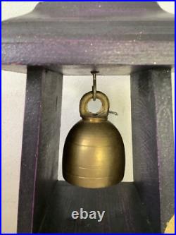 Vintage Thailand Buddhist brass bell on the wood tower stand