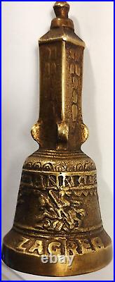 Vintage solid brass heavy handbell Zagreb Croatia handle shape of Lotrscak tower