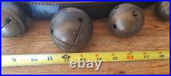 Vtg. Sleigh bells solid brass graduated 1 3/8 2 1/2in. Horse neck collar best